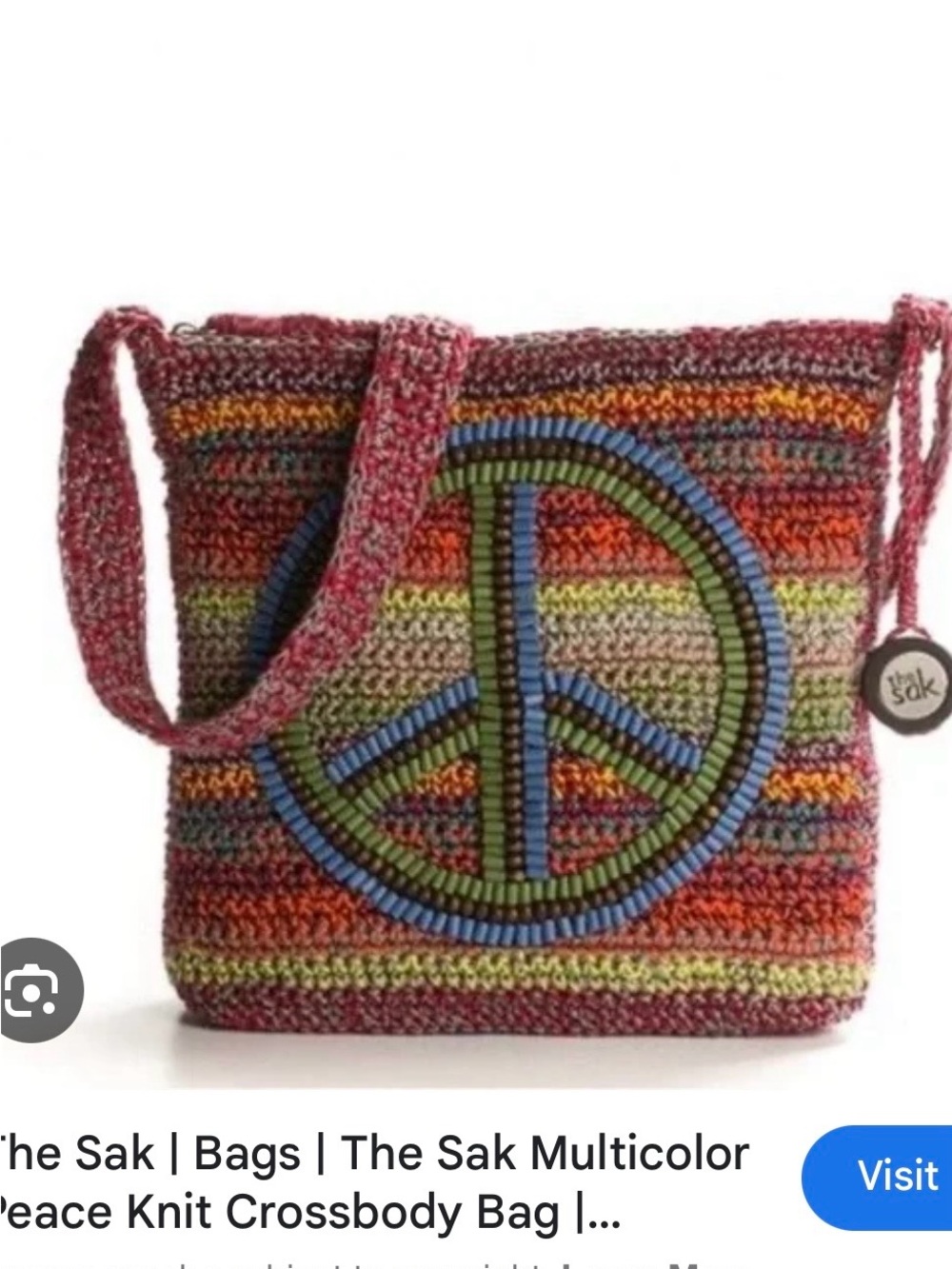 The Sak crossbody peace sign woven bag